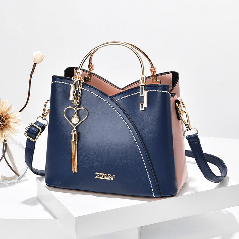 Bolso de mano llavero corazón varios colores