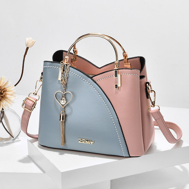 Bolso de mano llavero corazón varios colores